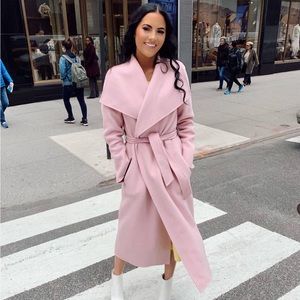 Mackage long pink coat. Seen on influencers Rachel parcel and Emily Jackson.